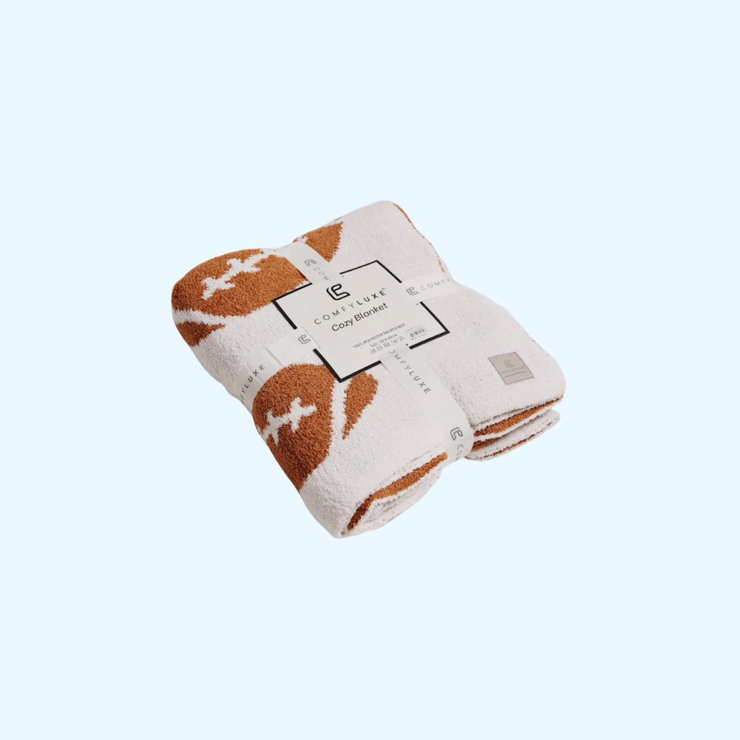 Cozy football throw blanket with brown football pattern