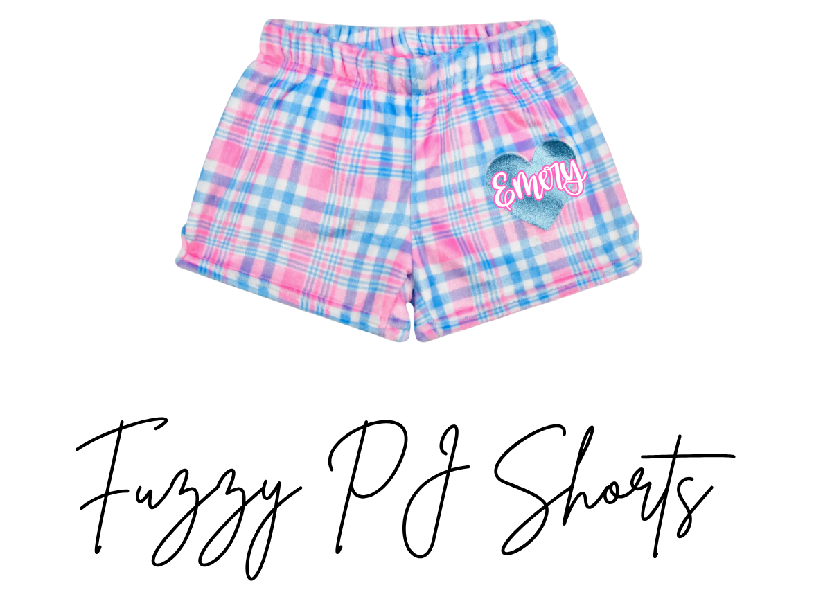 Plaid fuzzy PJ shorts with 'Emery' on a white background